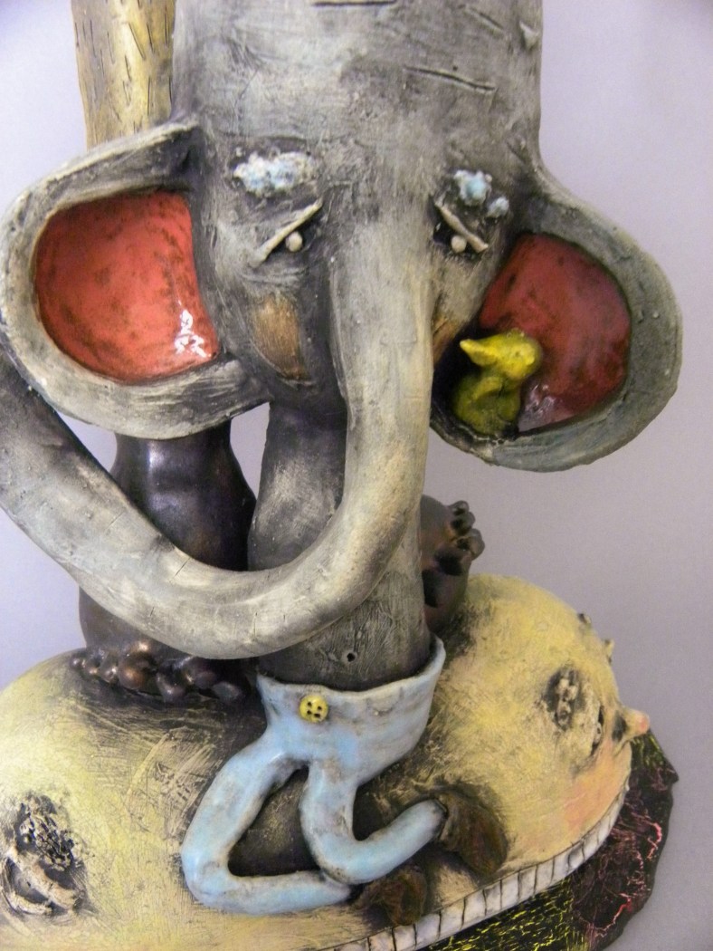 here is a detail of the seated elephant