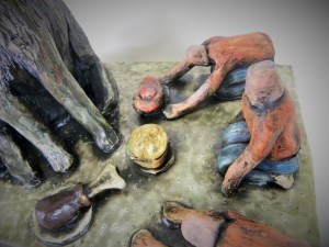 detail of the plebeians making offerings to their Dog God---steak, hamburger, and a turkey leg. 